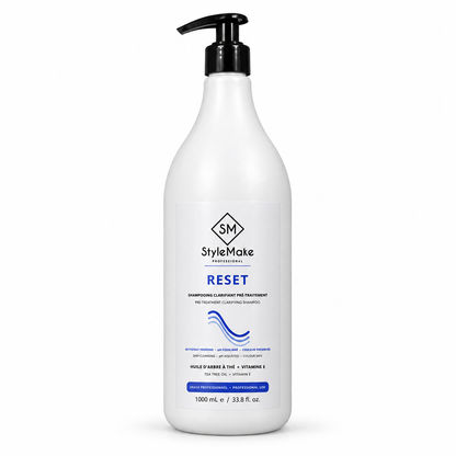 StyleMake Professional RESET 1000 mL pre-treatment clarifying shampoo in a white pump bottle, front view on white.
